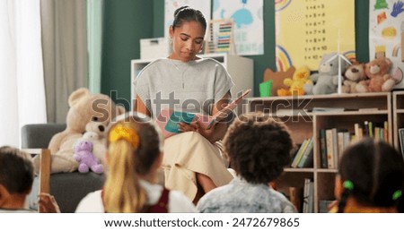 Kindergarten, teacher and reading a story to children in montessori school, classroom and learning. Kids, fairytale and woman teaching language in fantasy with creativity in preschool education