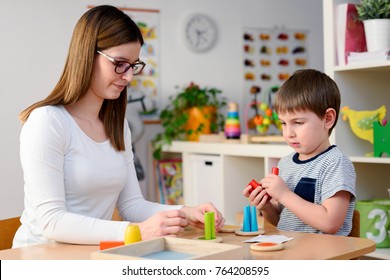 Kindergarten Teacher Supports Cute Boy Educational Stock Photo ...