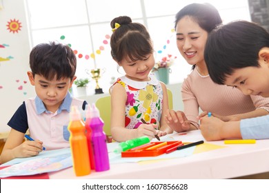 Kindergarten teachers and the children