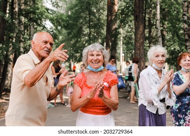 Kineshma, Russia - July, 2021: Active Happy Seniors, People Dancing In Central Park To The Sounds Of A Live Orchestra, Young At Heart, Active Old Age, Lifestyle Concept. 