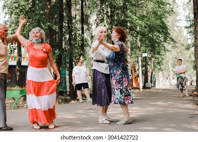 Kineshma, Russia - July, 2021: Active Happy Seniors, People Dancing In Central Park To The Sounds Of A Live Orchestra, Young At Heart, Active Old Age, Lifestyle Concept. 