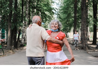 Kineshma, Russia - July, 2021: Active Happy Seniors, People Dancing In Central Park To The Sounds Of A Live Orchestra, Young At Heart, Active Old Age, Lifestyle Concept. 