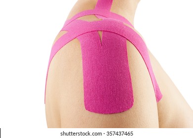 Kinesio tape on shoulder on beautiful girl. Alternative medicine rehab. - Powered by Shutterstock