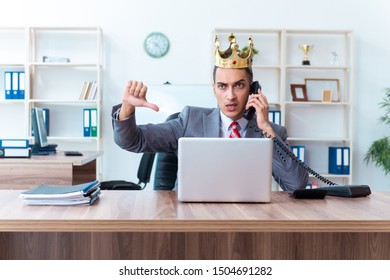 King businessman at his workplace