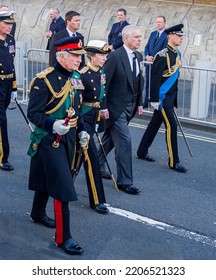 King Charles III, Princess Anne, Prince Andrew, And Prince Edward Walking After The Coffin Of Her Majestry The Queen Elizabeth II.