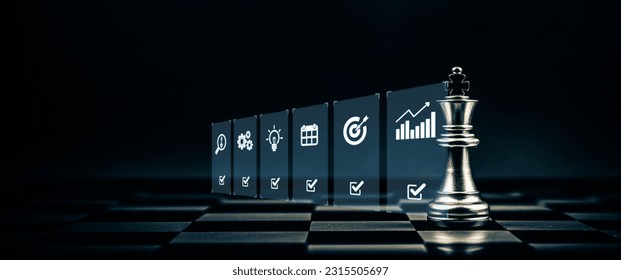 King chess pieces with strategy icons concepts of leadership or wining challenge battle fighting of business team player and risk management or human resource or strategic planning.