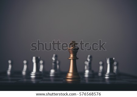 King and Knight of chess setup on dark background . Leader and teamwork concept for success.
