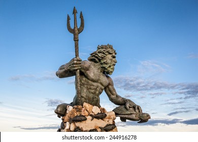 King Neptune statute, famous tourist attraction at Virginia Beach against a blue sky in summer