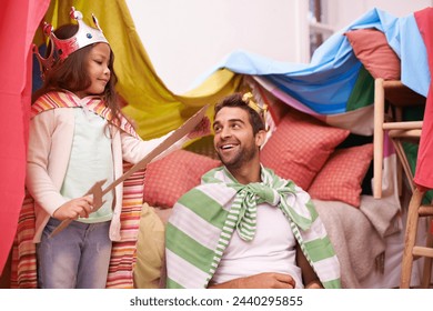 King, play or dad with princess in home in a bedroom fort with crown costume, girl or parent. Family castle, happiness or smile with a knight, father or an excited child in a dress up or sword game - Powered by Shutterstock