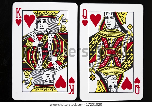 King and
Queen of Hearts against black
background