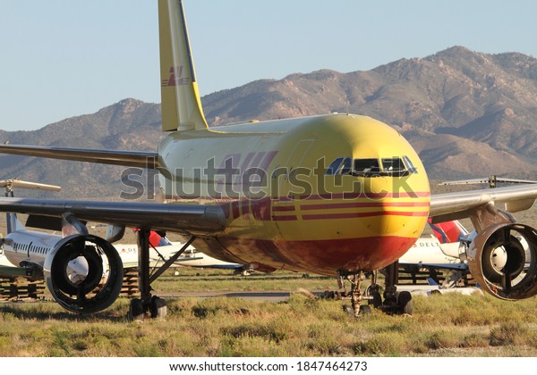 Kingman, United\
States of America - June 2018: Airplanes in storage at Kingman\
Airport in the Arizona desert\

