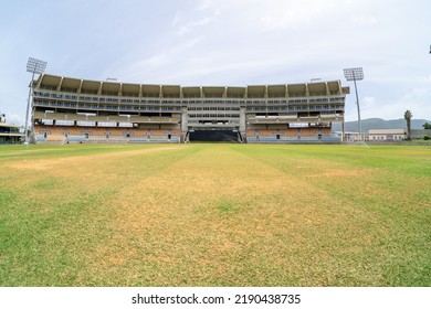 Kingston, Jamaica - May 23, 2022: Sabina Park Cricket Stadium. Ultra Wide Angle Photo From The Center Of The Pitch. Empty Cricket Ground. International Cricket Venue