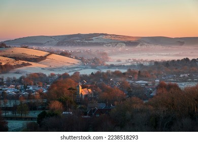 Kingston near Lewes St Pancras church catching the sunrise on a frosty December morning from Kingston Ridge south downs east Sussex south east England - Shutterstock ID 2238518293
