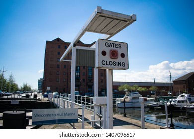 Kingston Upon Hull, England - 12th May 2019: Hull marina, the bridge that allows boats to exit and enter the area to the River Humber via opening the gates and changing the water level. Danger sign.