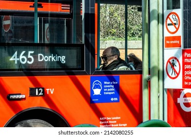 Kingston Upon Thames London UK, April 01 2022, Senior Elderly Man Sitting On A Red London Bus Wearing Sunglasses Alone