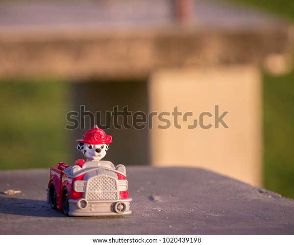 Kingston/Jamaica - February 8, 2018 - Toy truck on a\
concrete slab