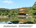 Kinkakuji (金閣寺, Golden Pavilion) is a Zen temple in northern Kyoto whose top two floors are completely covered in gold leaf