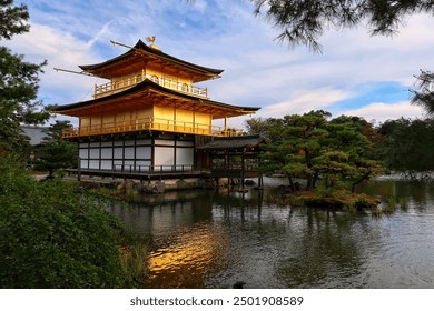 Kinkaku-ji (金閣寺, literally "Temple of the Golden Pavilion"), officially named Rokuon-ji (鹿苑寺, literally "Deer Garden Temple"), is a Zen Buddhist temple in Kyoto. - Powered by Shutterstock