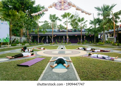 Kintamani, Bali, Indonesia - 28 June 2019: Group Of Balinese People Doing Yoga And Laying Down Meditation Together In A Retreat Making Circle At The Outdoor Park.