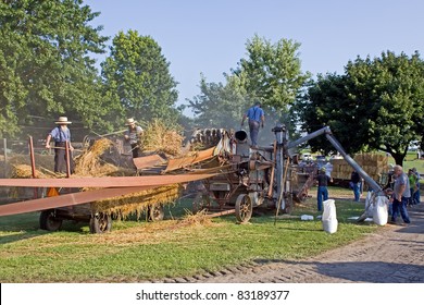 KINZERS, PENNSYLVANIA - AUGUST 17: Demonstration of a vintage threshing machine on August 17, 2011 in Kinzers,Pennsylvania.This is an event at Rough & Tumble Engineers annual Threshermen's Reunion.