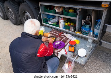 Kirikkale/Turkey-October 27 2019: Truck Driver Takes A Break In His Portable Kitchen With Cupboards Of Food While Resting