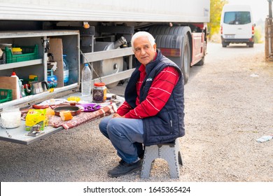 Kirikkale/Turkey-October 27 2019: Truck Driver Takes A Break In His Portable Kitchen With Cupboards Of Food While Resting