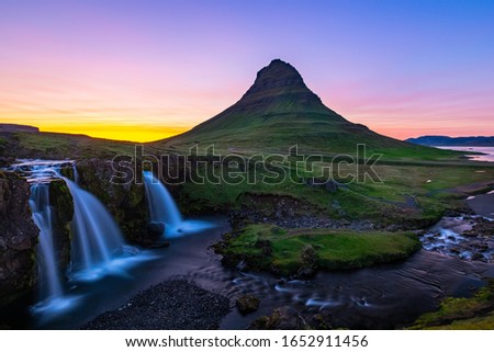 Kirkjufell mountain and Kirkjufellsfoss waterfall are placed very close to each other in the Snæfellsnes peninsula, near the town of Grundarfjörður. It is a must-see for anyone visiting Iceland!
