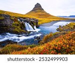 Kirkjufell mountain landscape view point with water fall in autumn season, the north coast of Iceland