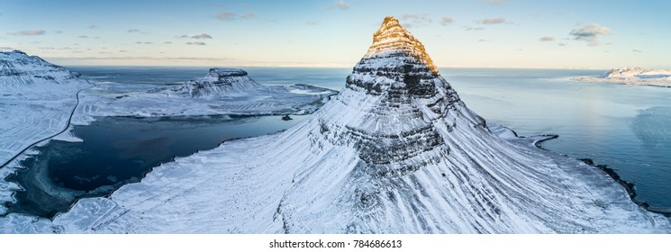 Kirkjufell waterfall with mountain in winter, Iceland, Europe.