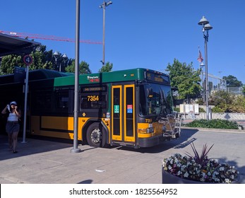 Kirkland, WA / USA - Circa August 2020: A King County Metro Bus Displaying Masks Required On Their Marquee