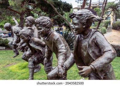 Kirkland, WA USA - circa August 2021: View of the Puddle Jumpers bronze sculpture by the marina in downtown Kirkland.