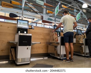 Kirkland, WA USA - Circa August 2021: View Of A Self Checkout Section Inside A Whole Foods Market.