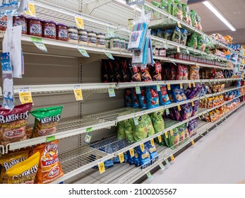 Kirkland, WA USA - Circa January 2022: Angled View Of Food Shortage In The Snack Aisle In A Safeway Grocery Store During Heavy Snow Storms Across Washington.