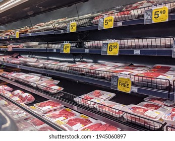 Kirkland, WA USA - Circa March 2021: Angled View Of The Meat And Seafood Department At A QFC Grocery Store.