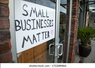 Kirkland, Washington / USA - June 2 2020: "Small Businesses Matter" sign in the front window of a clothing shop in downtown Kirkland