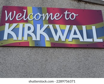 kirkwall sign scotland church red flowers cemetery