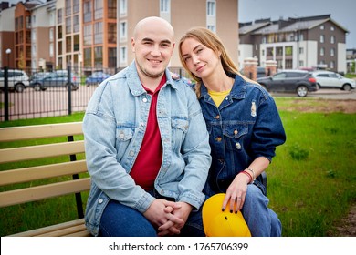 Kirov, Russia - June 22, 2020: European Couple Of Blonde Woman And Bald Man Walking At Park, Enjoying Themselves And Being Happy Together. Love And Tenderness. Lovers On Date Outdoors At Nature