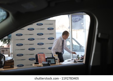 Kirov, Russia - March 14, 2018: Manager in showroom of dealership Ford in Nizhny Novgorodcity in 2018 - Shutterstock ID 1192783405