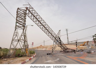 KIRYAT GAT, ISR - MAY 04 2009:Toppled overhead power line. High voltage transmission and distribution lines carry a lot of energy or power and if not treated with respect can be fatal.