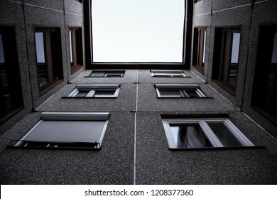 Kiskunhalas, Bács-kiskun / Hungary - 12.31.2016.: A Low Angle View Of A Flat Apartment With Windows.