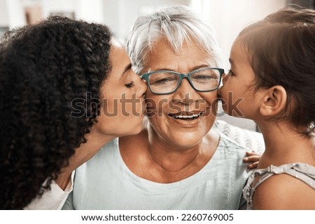 Kiss, affection and children with grandmother for love, birthday or mothers day. Gratitude, care and an elderly woman with a baby and daughter kissing for appreciation, caring and loving at home