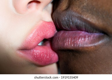 Kiss. Black man kissed caucasian woman. I Love You. Mixed race couple In Love. Intimate relationship and sexual relations. Closeup mouths kissing. Passion and sensual touch. Romantic and love