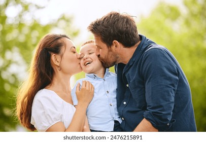 Kiss, happy and family with child outdoor park together for bonding, love and support on summer vacation. Woman, man and kid smile with care, trust and respect for childhood memory on holiday - Powered by Shutterstock