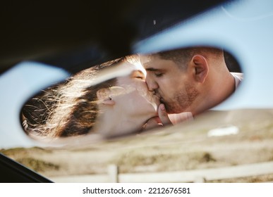 Kiss, Mirror And Couple On A Road Trip For Holiday During Marriage Together. Young Man And Woman With Love And Affection Going On Vacation In Mexico And Kissing While On A Calm Drive In Nature