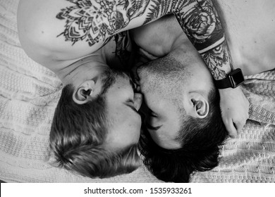 Kiss Two Gay Men Close Up Top View. Black And White Photography