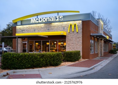Kissimmee, Florida - February 6, 2022: Night Closeup View Of McDonald's Restaurant Building Exterior.