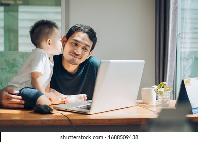 Kissing Moment, Father And Little Son Happy Family With Laptop Computer On Workplace At Office Home Happiness Laughing Together, Working At Home Concept.