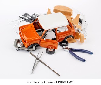 Kit For Assembling Plastic Car Model On White Background