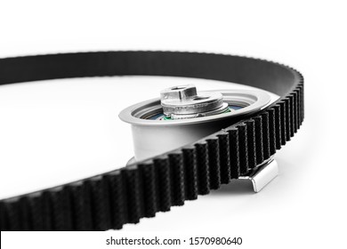 Kit Of Timing Belt With Rollers On A White Background Isolated. Auto Parts