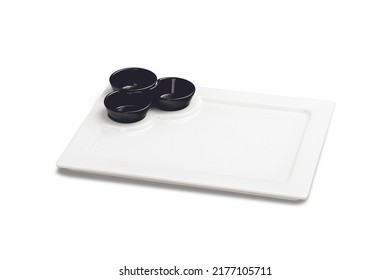 Kit With White Ceramic Rectangular Serving Plate, With Three Black Ramekin, Isolated On White